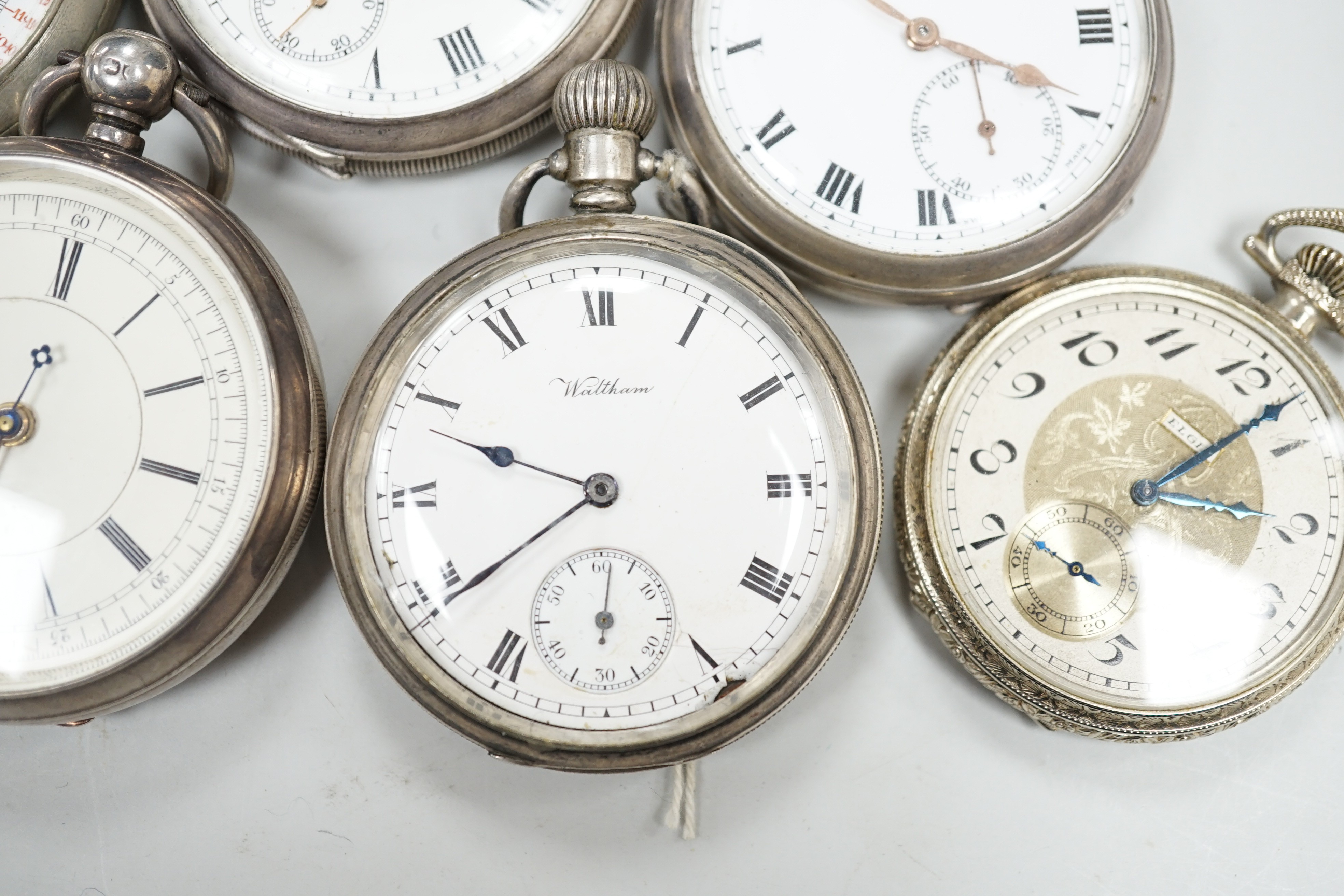 Four assorted silver open faced pocket watches including two Waltham and a J.W. Benson and two other base metal pocket watches.